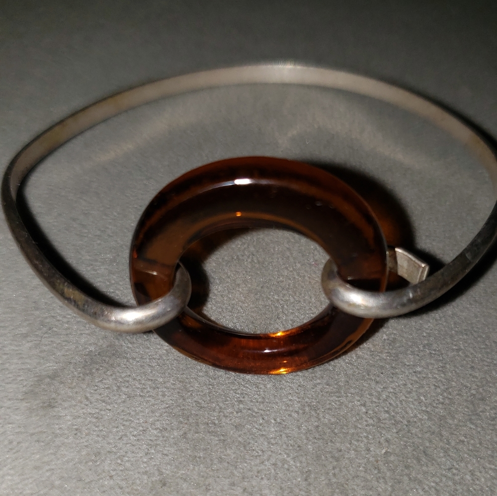 Bracelet silver tone amber colored stone